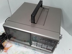 Vintage General Electric Portable 5″ VHF/UHF TV FM/AM Radio (no. 7-7150B)