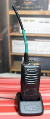 Kenwood KSC-35S handheld radio with charging base